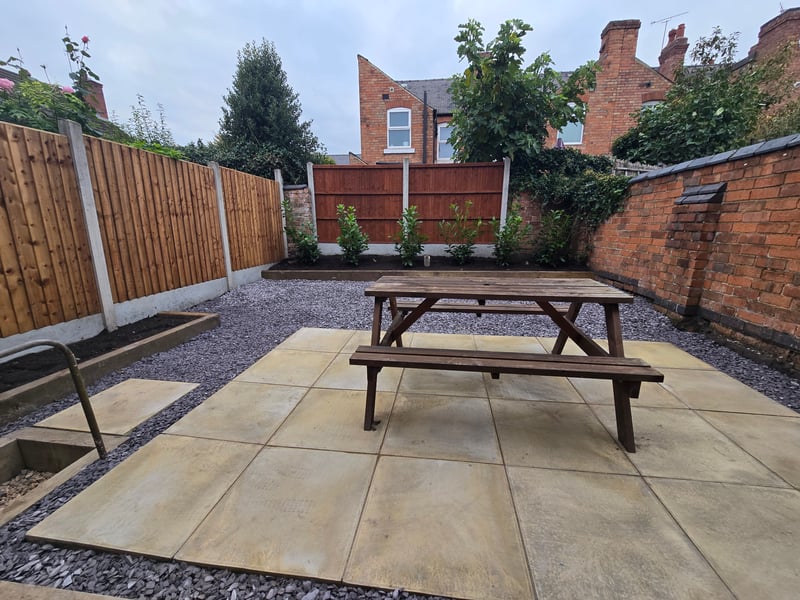 Renovated garden with new paving and fencing in Derby