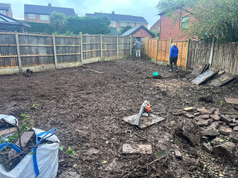 Bare plot with debris piles, start of groundwork in Derby